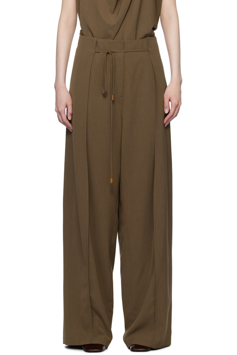 Stretch polyester twill trousers. 

· Removable self-tie drawstring at waistband
· Four-pocket styling
· Zip-fly
· Folded panel at front legs
· Full satin lining

Supplier color: Brown