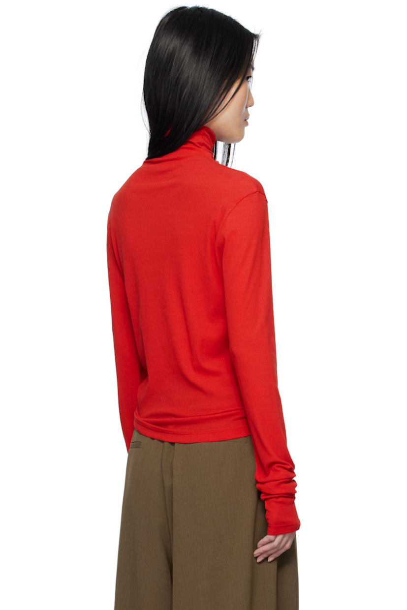 Semi-sheer cotton ribbed jersey turtleneck.

Supplier color: Red