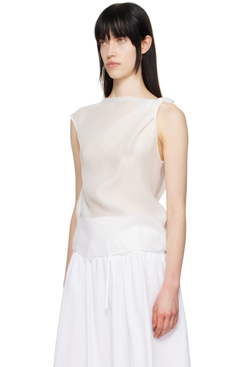 Semi-sheer crinkled tencel-blend crêpe tank top. Draping throughout.

· Boatneck
· Curved hem
· Twisted detailing at shoulder

Supplier color: White