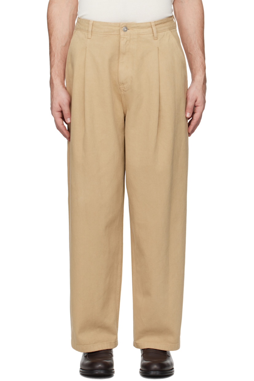 Wide-leg overdyed non-stretch denim jeans.

· Belt loops
· Four-pocket styling
· Zip-fly
· Pleats at front
· Logo patch at back waistband

Supplier color: Beige
