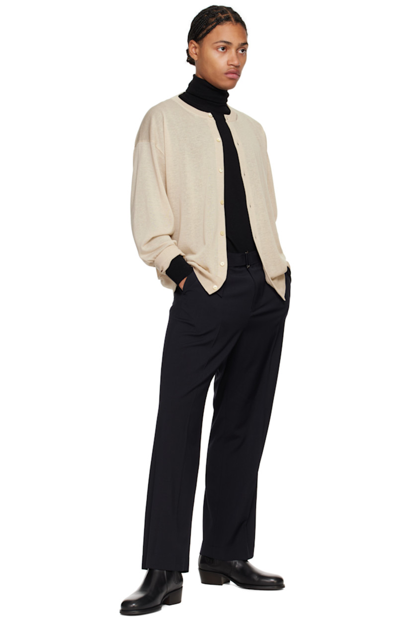 Lightweight stretch wool-blend twill trousers. 

· Belt loops and detachable cinch belt
· Four-pocket styling 
· Zip-fly
· Pleats at front 
· Creased legs

Supplier color: Navy