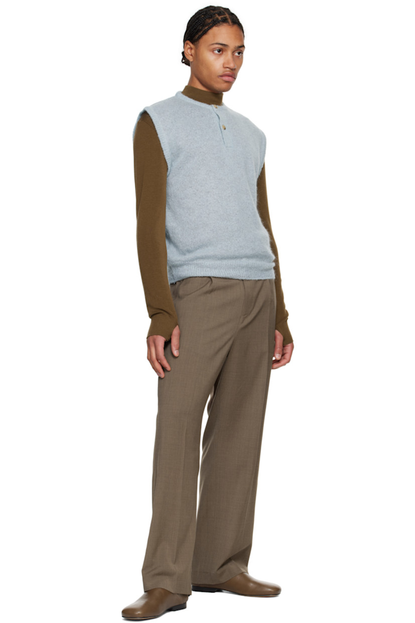 Lightweight stretch wool-blend twill trousers. 

· Belt loops and detachable cinch belt
· Four-pocket styling 
· Zip-fly
· Pleats at front 
· Creased legs

Supplier color: Beige