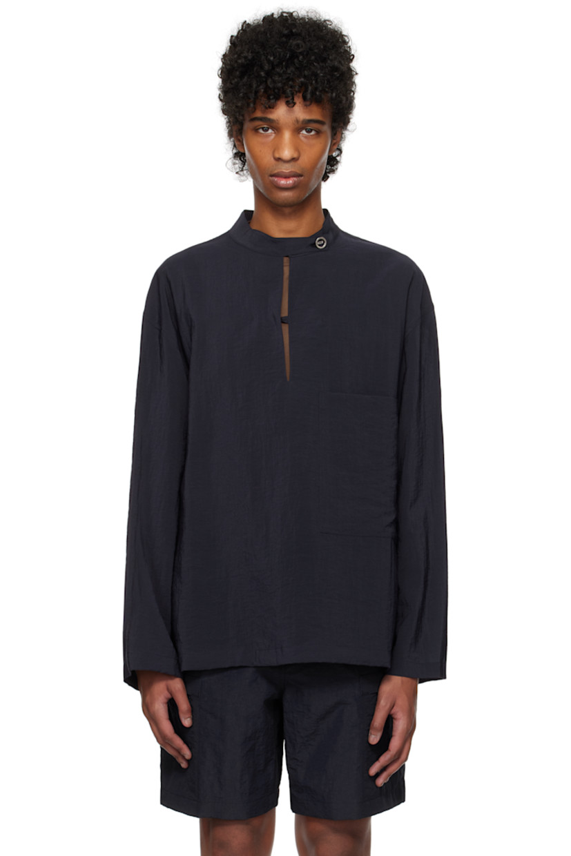 Crinkled plain-woven rayon-blend shirt. 

· Button tab at band collar
· Keyhole at chest
· Patch pocket
· Dropped shoulders
· Logo hardware at back collar
· Twin pleats at yoke

Supplier color: Navy