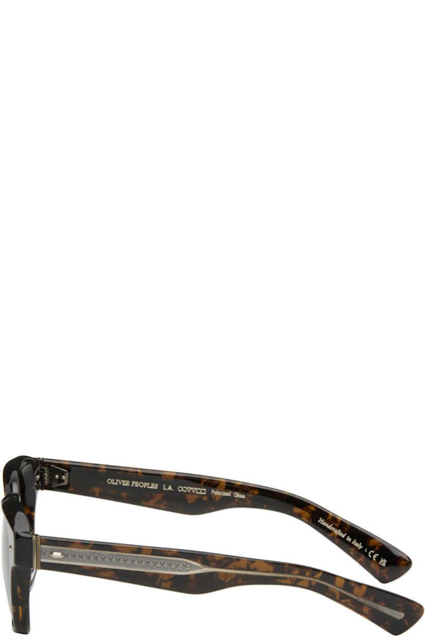 Handcrafted square semi-transparent tortoiseshell acetate-frame sunglasses in brown.

· Polarized khaki lenses
· 100% UVA/UVB protection
· Keyhole bridge
· Integrated nose pads
· Exposed core wires
· Includes pouch
· Size: 50.21 145

Supplier color: Walnut tortoise