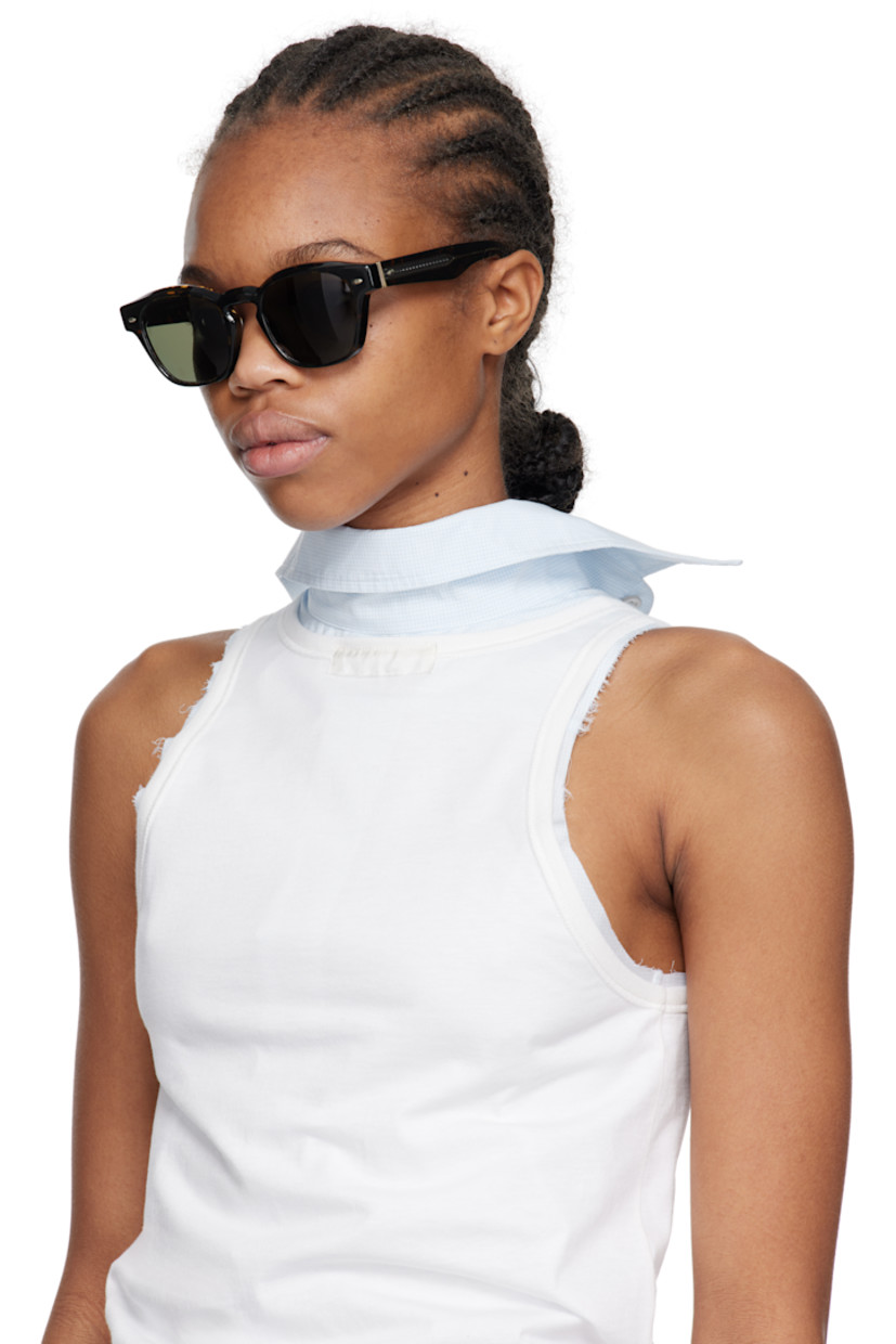 Handcrafted square semi-transparent tortoiseshell acetate-frame sunglasses in brown.

· Polarized khaki lenses
· 100% UVA/UVB protection
· Keyhole bridge
· Integrated nose pads
· Exposed core wires
· Includes pouch
· Size: 50.21 145

Supplier color: Walnut tortoise