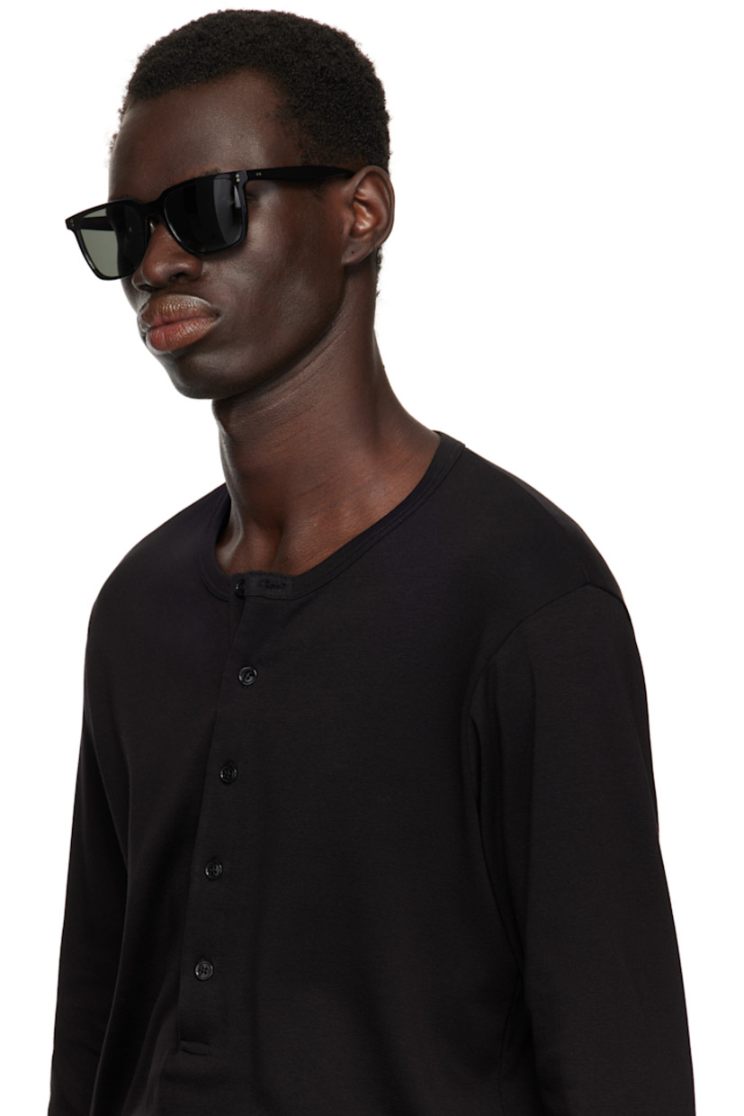 Handcrafted rectangular acetate-frame sunglasses in black.

· Polarized gray lenses 
· 100% UVA/UVB protection
· Integrated nose pads
· Inset hardware at face
· Includes case
· Size: 53.19 145

Supplier color: Black/Midnight express