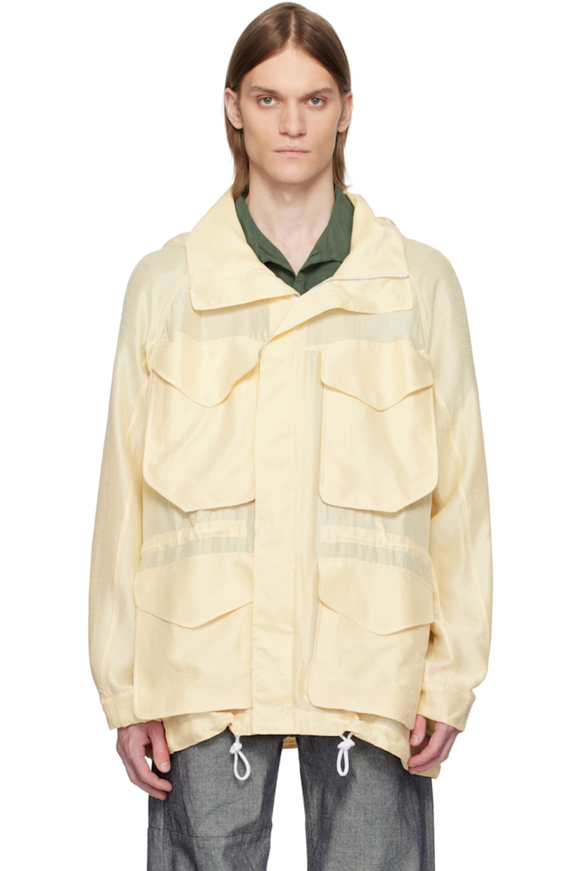 Semi-sheer silk ripstop jacket. 

· Drawstring at brimmed hood, waist, and hem
· Funnel neck
· Concealed zip closure
· Bellows pockets
· Raglan sleeves
· Inset elasticized cuffs
· Logo flag at back collar

Supplier color: Barley