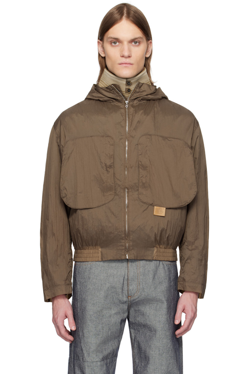Lightweight crinkled nylon taffeta jacket. 

· Concealed drawstring at hood 
· Detachable inset rib-knit funnel neck
· Zip closure 
· Zip pockets 
· Leather logo flag at chest 
· Elasticized hem
· Inset rib-knit cuffs 

Supplier color: Monk's robe