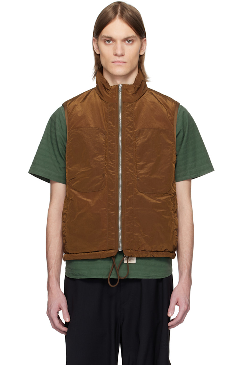 Insulated nylon taffeta vest.

· Stand collar
· Zip closure
· Zip pockets
· Drawstring at hem
· Rib-knit trim at armscyes
· Logo embroidered at back collar

Supplier color: Bronze brown