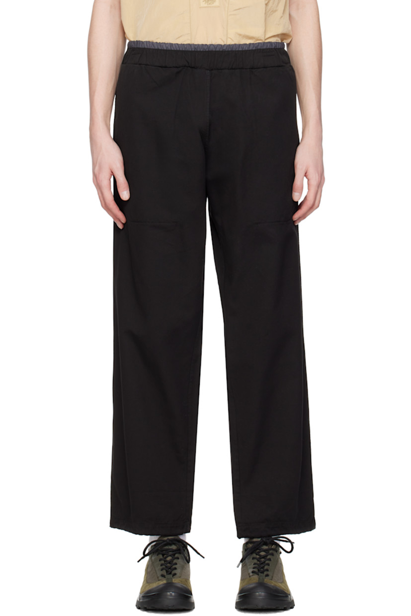 Cotton canvas track pants. 

· Elasticized waistband
· Two-pocket styling
· Concealed drawstring at cuffs
· Logo patch at back waistband 

Supplier color: Black