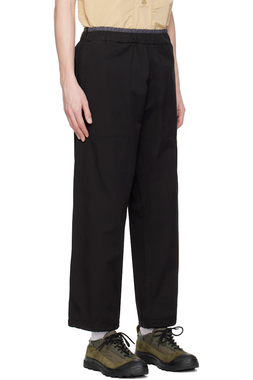 Cotton canvas track pants. 

· Elasticized waistband
· Two-pocket styling
· Concealed drawstring at cuffs
· Logo patch at back waistband 

Supplier color: Black