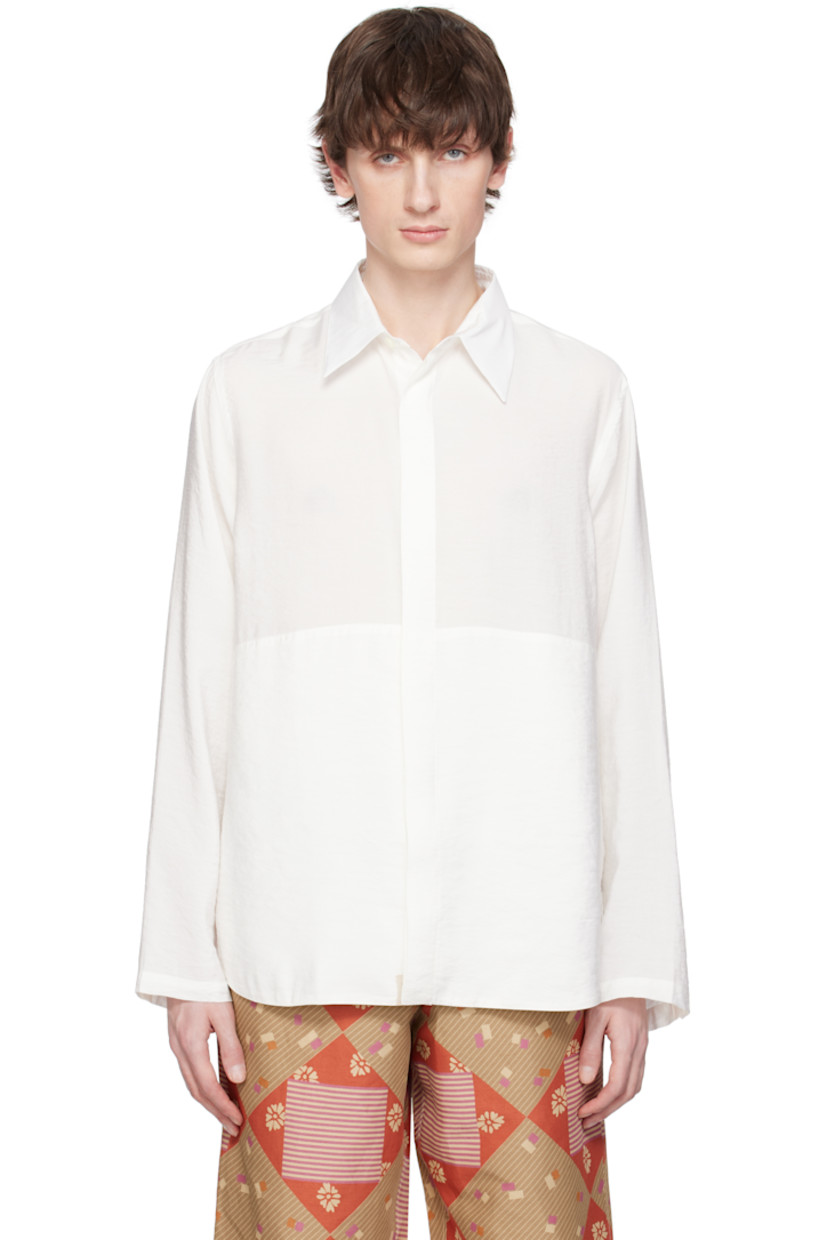 Modal-blend gauze shirt. 

· Spread collar
· Button closure
· Logo patch at hem
· Concealed button fastening at cuffs
· Partially lined

Supplier color: Tofu