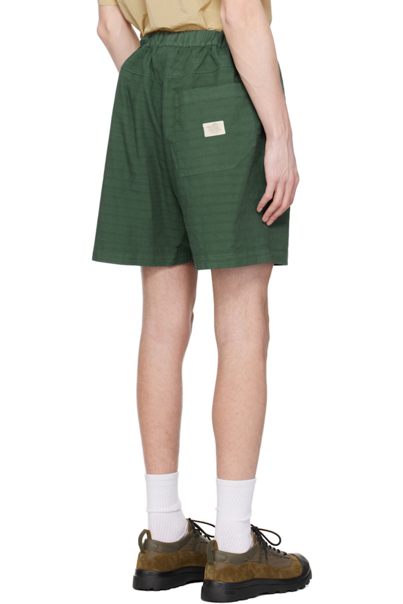 Plain-woven cotton- and silk-blend shorts. Stripes throughout.

· Elasticized waistband
· Three-pocket styling
· Logo patch at back pocket

Supplier color: Kombu green