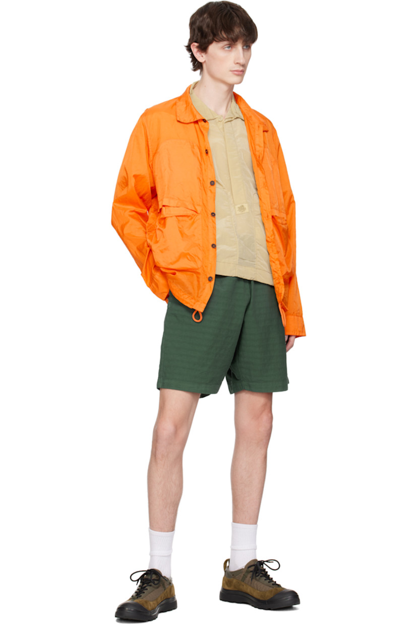 Plain-woven cotton- and silk-blend shorts. Stripes throughout.

· Elasticized waistband
· Three-pocket styling
· Logo patch at back pocket

Supplier color: Kombu green