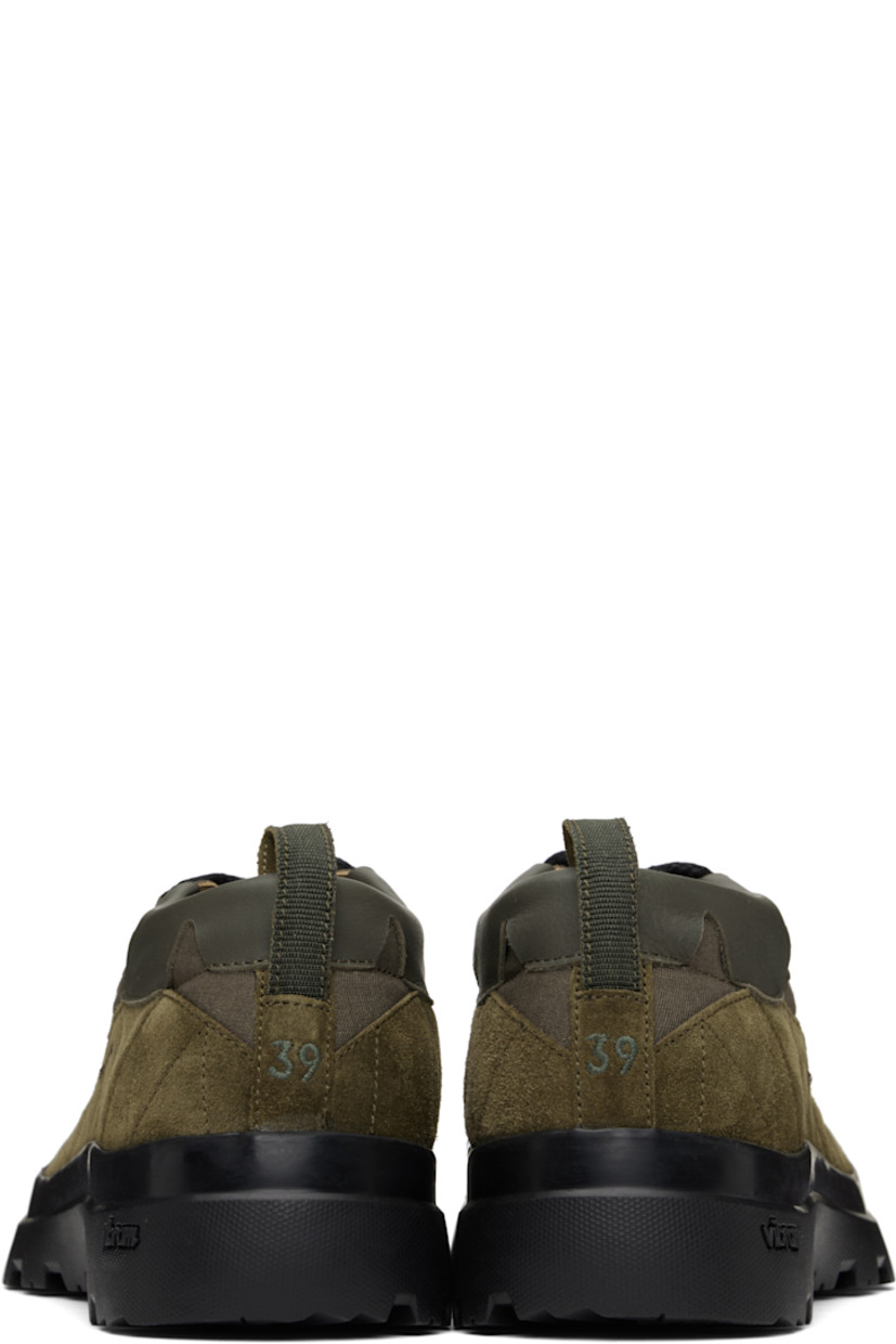Low-top suede, grained calfskin, and canvas sneakers in tones of khaki.

· Rubber cap toe
· Lace-up closure
· Logo embroidered at tongue
· Pull-loop at heel tab
· Treaded Vibram® rubber sole

Supplier color: Martini olive