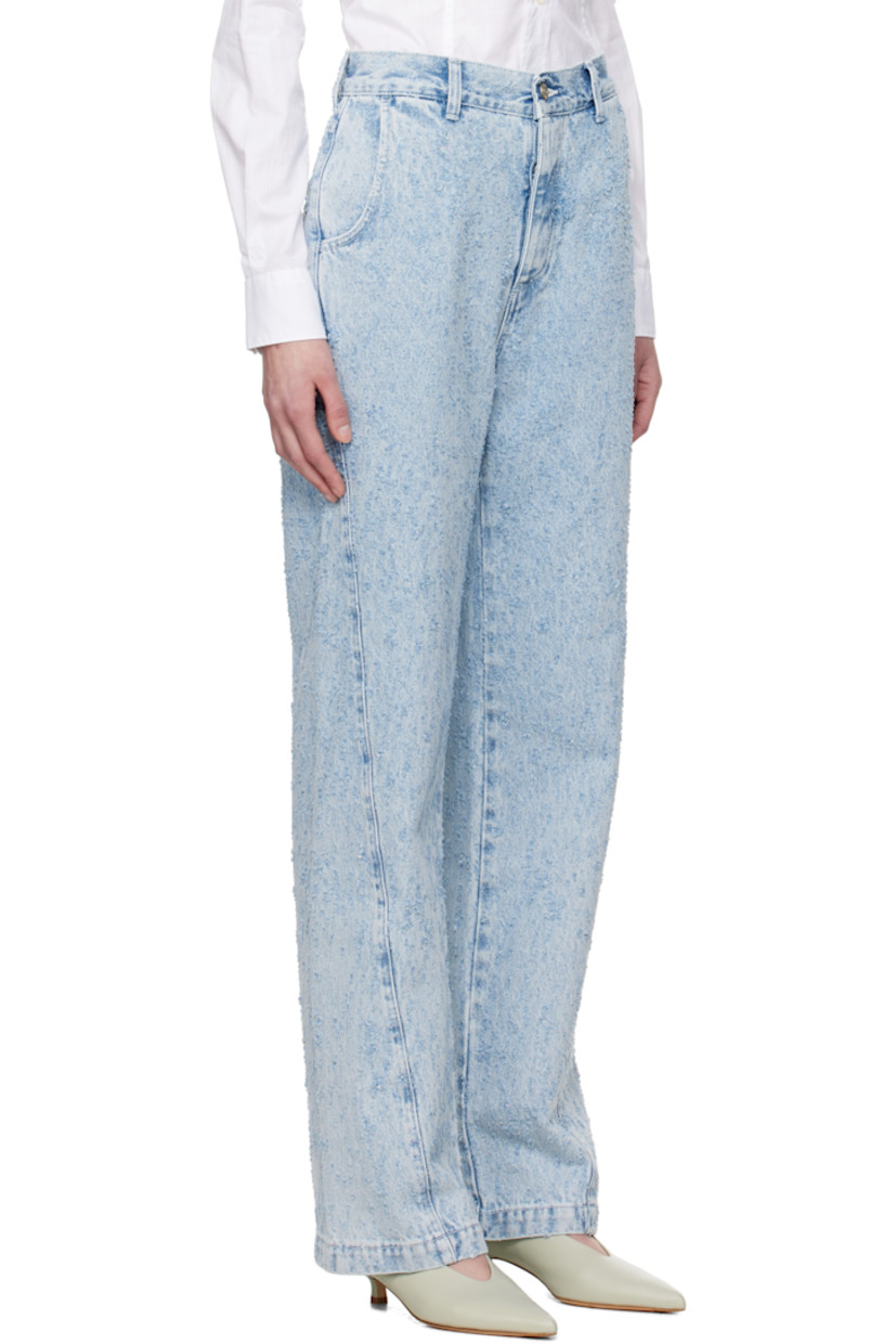 Non-stretch organic cotton denim jeans. Pilling and fading throughout.

· Relaxed-fit and straight-leg
· Mid-rise
· Belt loops
· Four-pocket styling
· Button fly
· Twisted side seams
· Logo-engraved silver-tone hardware

Supplier color: Light blue punch out