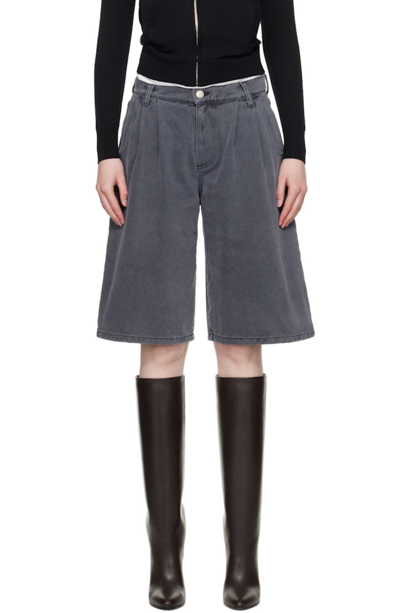 Wide straight-leg non-stretch organic cotton denim shorts. Fading throughout.

· Garment-washed and preshrunk
· Mid-rise
· Belt loops
· Four-pocket styling
· Zip fly
· Pleats at front
· Graphic silver-tone hardware

Supplier color: Slate