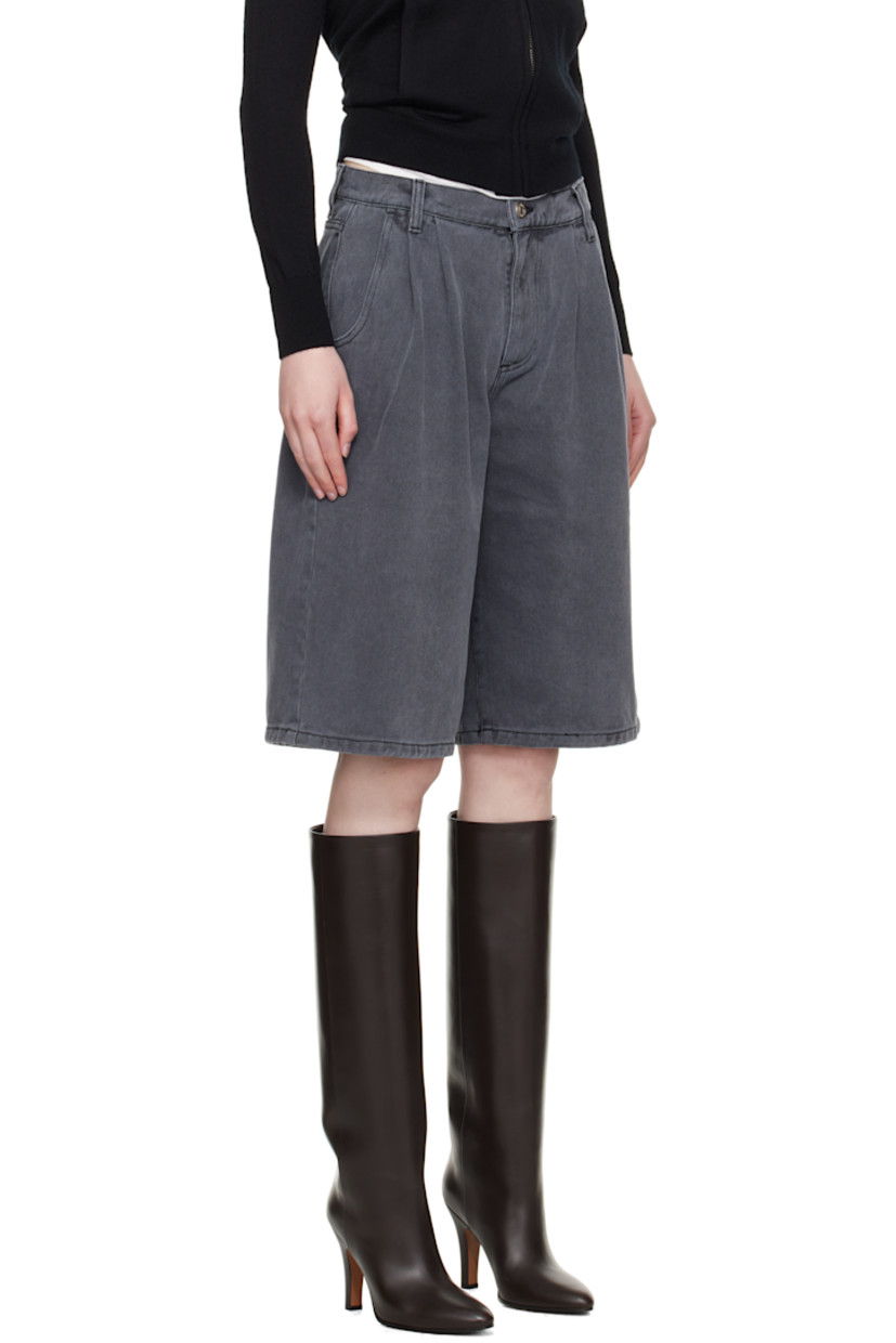 Wide straight-leg non-stretch organic cotton denim shorts. Fading throughout.

· Garment-washed and preshrunk
· Mid-rise
· Belt loops
· Four-pocket styling
· Zip fly
· Pleats at front
· Graphic silver-tone hardware

Supplier color: Slate