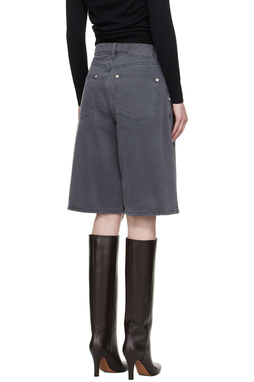 Wide straight-leg non-stretch organic cotton denim shorts. Fading throughout.

· Garment-washed and preshrunk
· Mid-rise
· Belt loops
· Four-pocket styling
· Zip fly
· Pleats at front
· Graphic silver-tone hardware

Supplier color: Slate