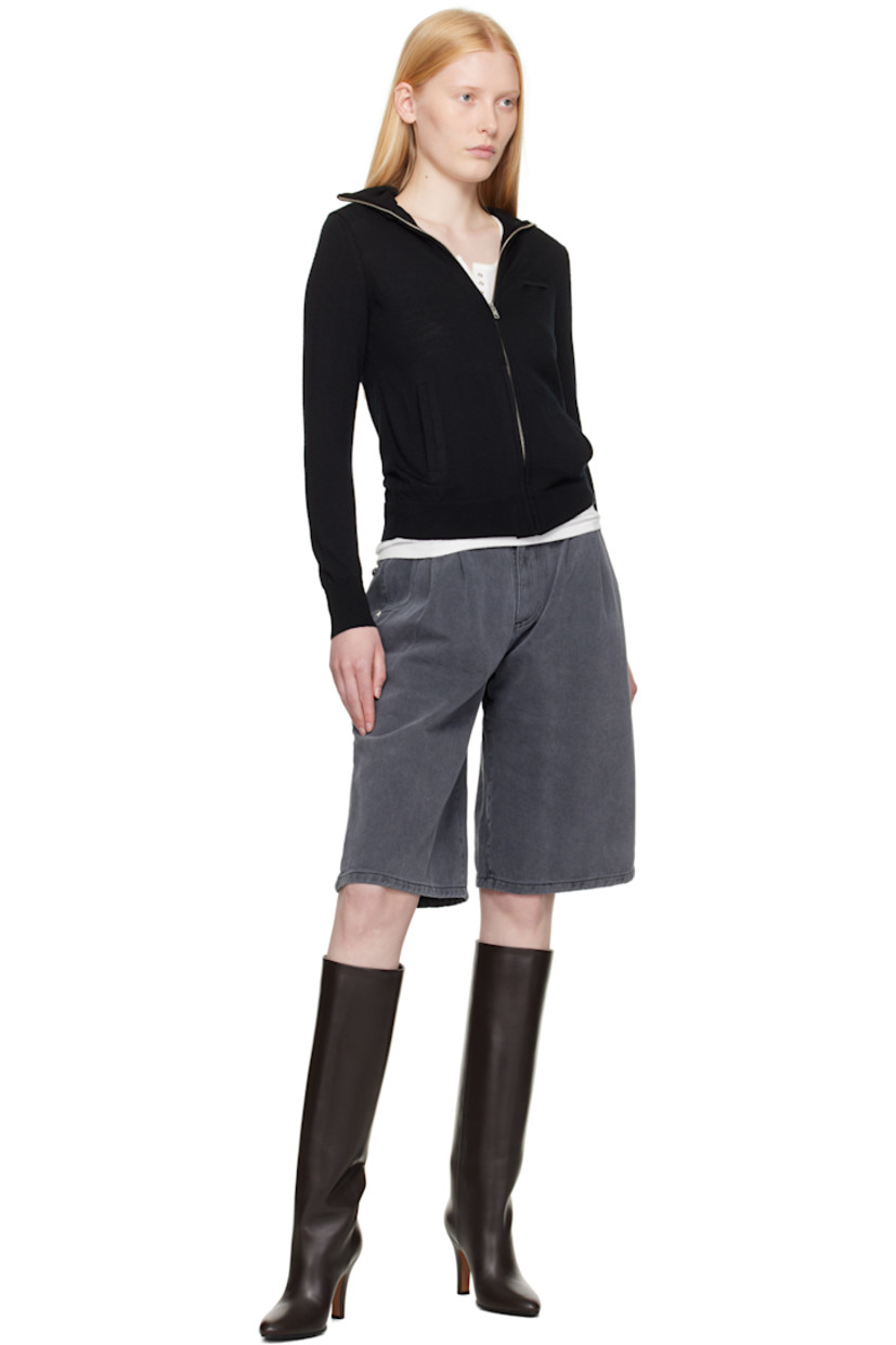 Wide straight-leg non-stretch organic cotton denim shorts. Fading throughout.

· Garment-washed and preshrunk
· Mid-rise
· Belt loops
· Four-pocket styling
· Zip fly
· Pleats at front
· Graphic silver-tone hardware

Supplier color: Slate