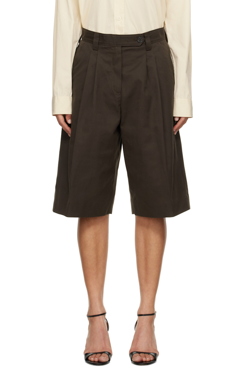 Wide-leg deadstock cotton twill shorts.

· Mid-rise
· Belt loops
· Four-pocket styling
· Zip fly
· Pleats at front
· Creased legs
· Darts at back waistband

Supplier color: Dark brown