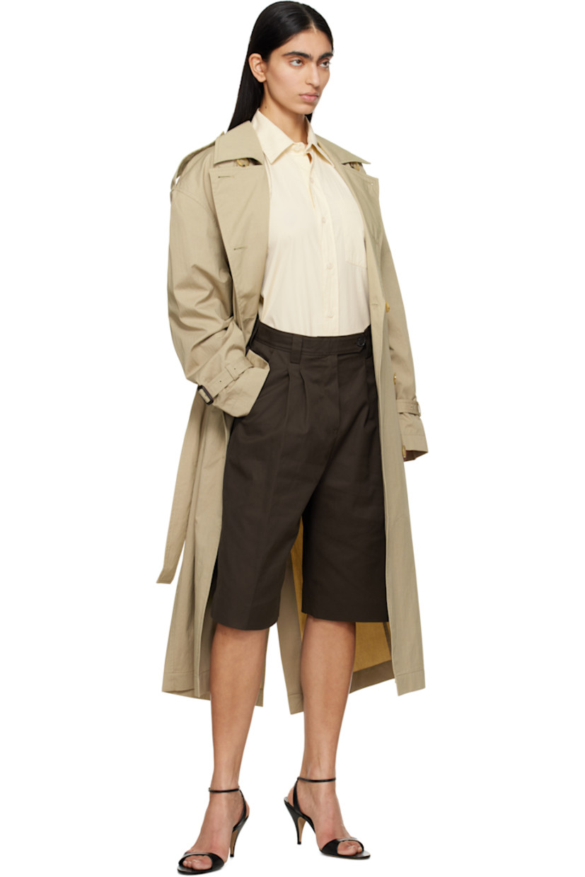 Wide-leg deadstock cotton twill shorts.

· Mid-rise
· Belt loops
· Four-pocket styling
· Zip fly
· Pleats at front
· Creased legs
· Darts at back waistband

Supplier color: Dark brown