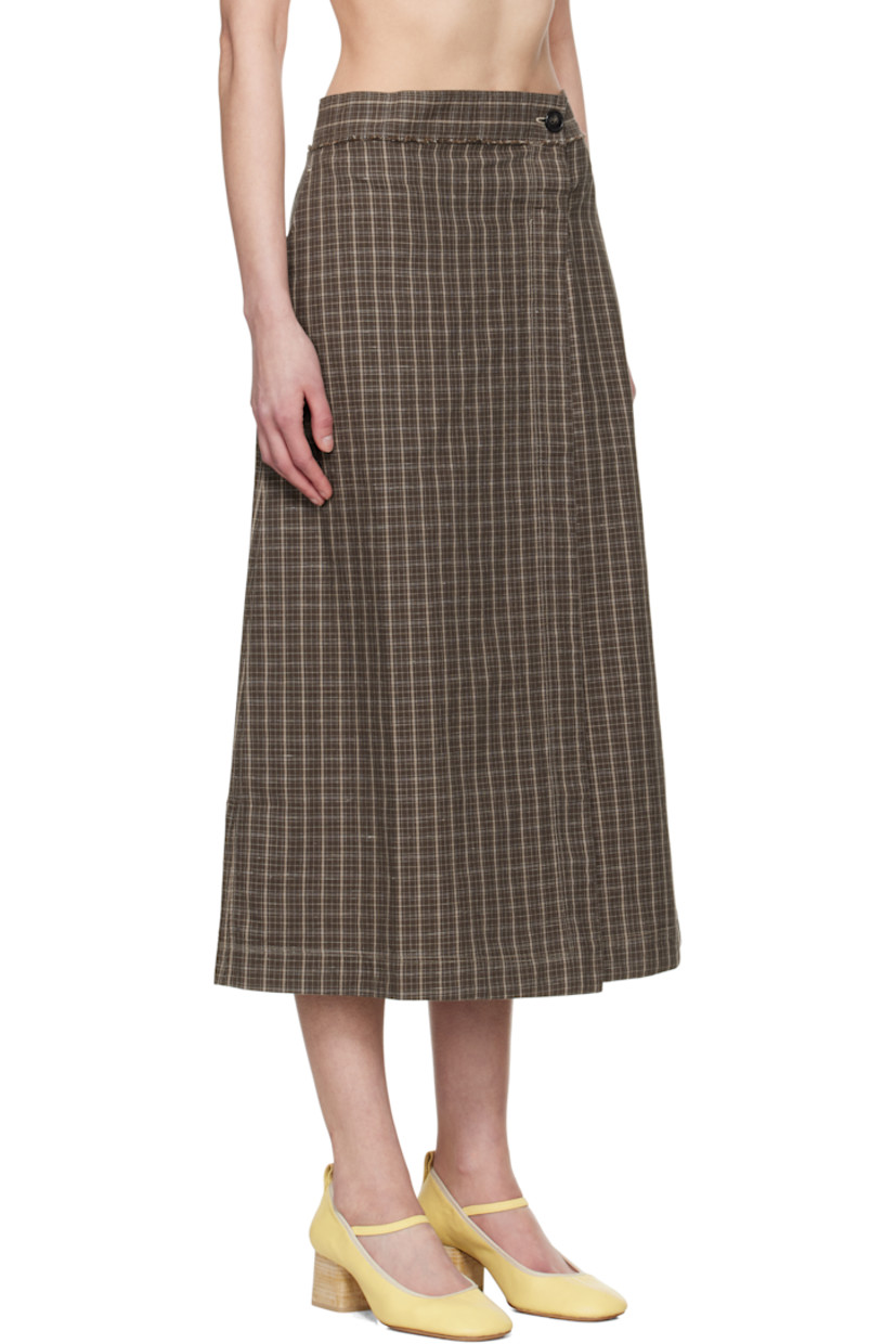 Garment-washed plain-woven cotton- and linen-blend midi skirt. Check pattern throughout. 

· Wrap construction
· Raw edge and button fastening at waistband
· Three-pocket styling

Supplier color: Brown linen check