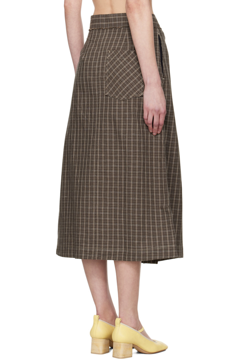 Garment-washed plain-woven cotton- and linen-blend midi skirt. Check pattern throughout. 

· Wrap construction
· Raw edge and button fastening at waistband
· Three-pocket styling

Supplier color: Brown linen check