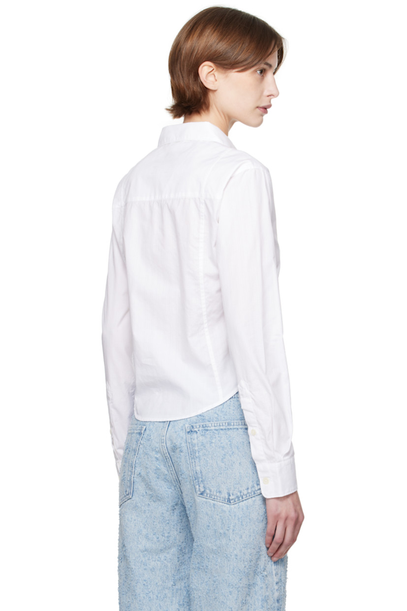 Lightweight cotton poplin shirt. Check pattern throughout. 

· Paneled construction  
· Spread collar
· Button closure
· Cropped shirttail hem
· Single-button barrel cuffs

Supplier color: Sheer check