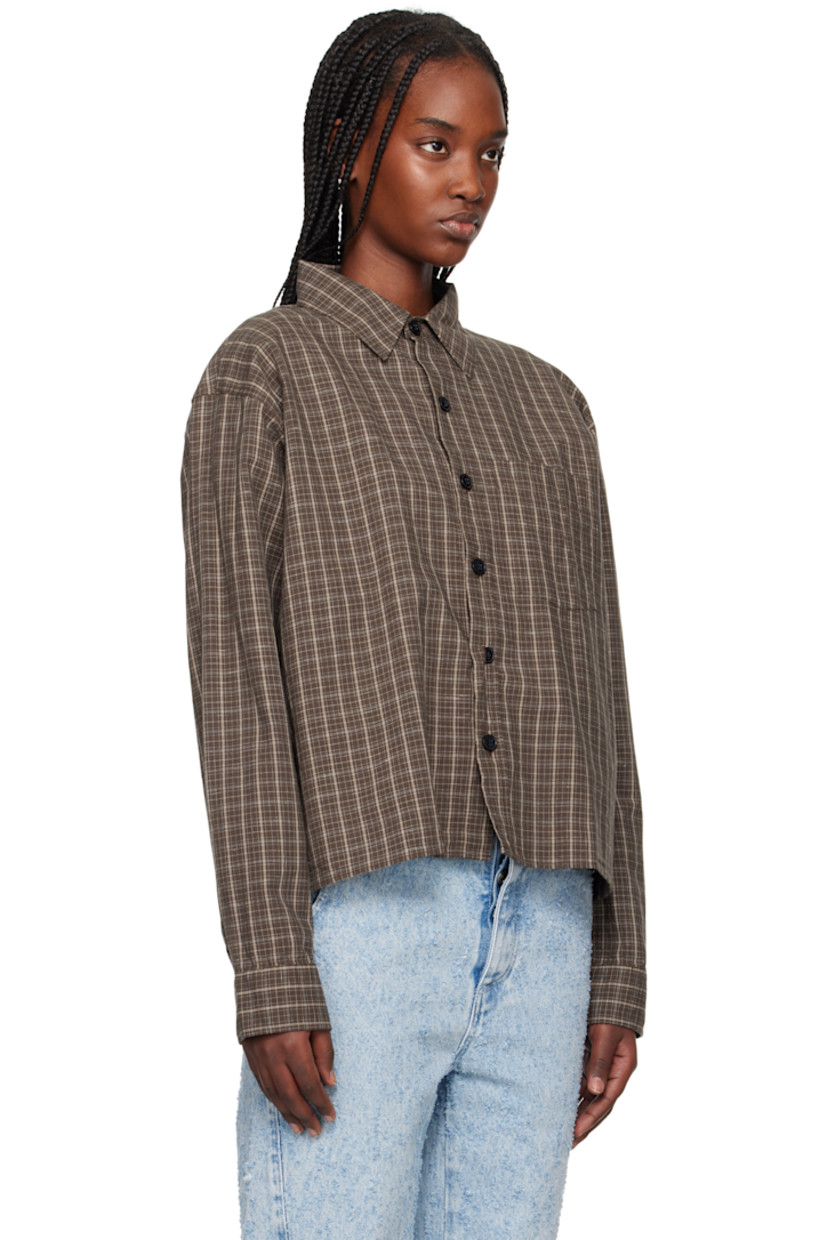 Boxy-fit plain-woven cotton- and linen-blend shirt. Check pattern throughout. 

· Garment-washed
· Spread collar
· Button closure 
· Patch pocket 
· Cropped hem 
· Buttoned barrel cuffs 
· Box pleat at yoke

Supplier color: Brown linen check