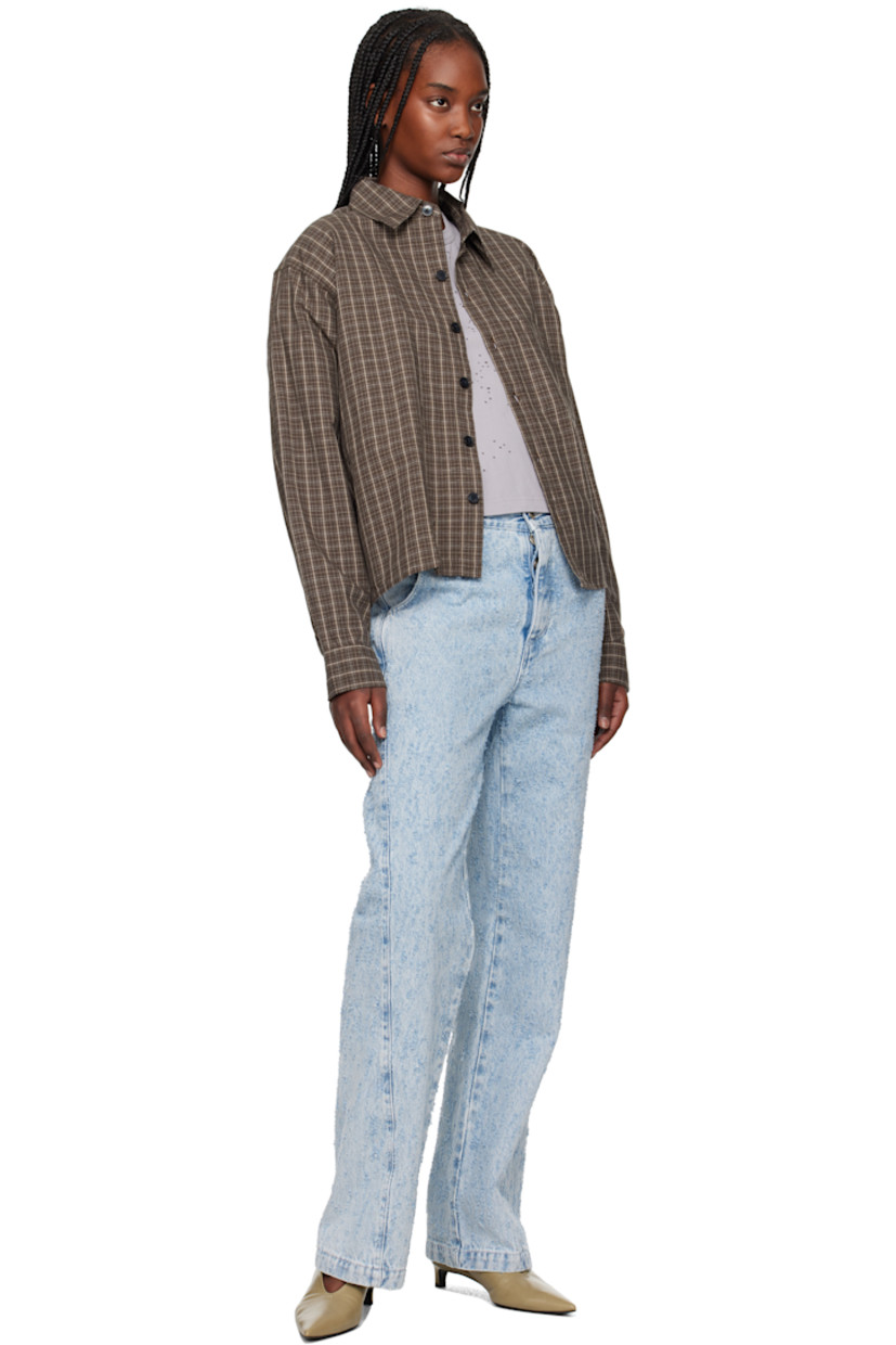 Boxy-fit plain-woven cotton- and linen-blend shirt. Check pattern throughout. 

· Garment-washed
· Spread collar
· Button closure 
· Patch pocket 
· Cropped hem 
· Buttoned barrel cuffs 
· Box pleat at yoke

Supplier color: Brown linen check