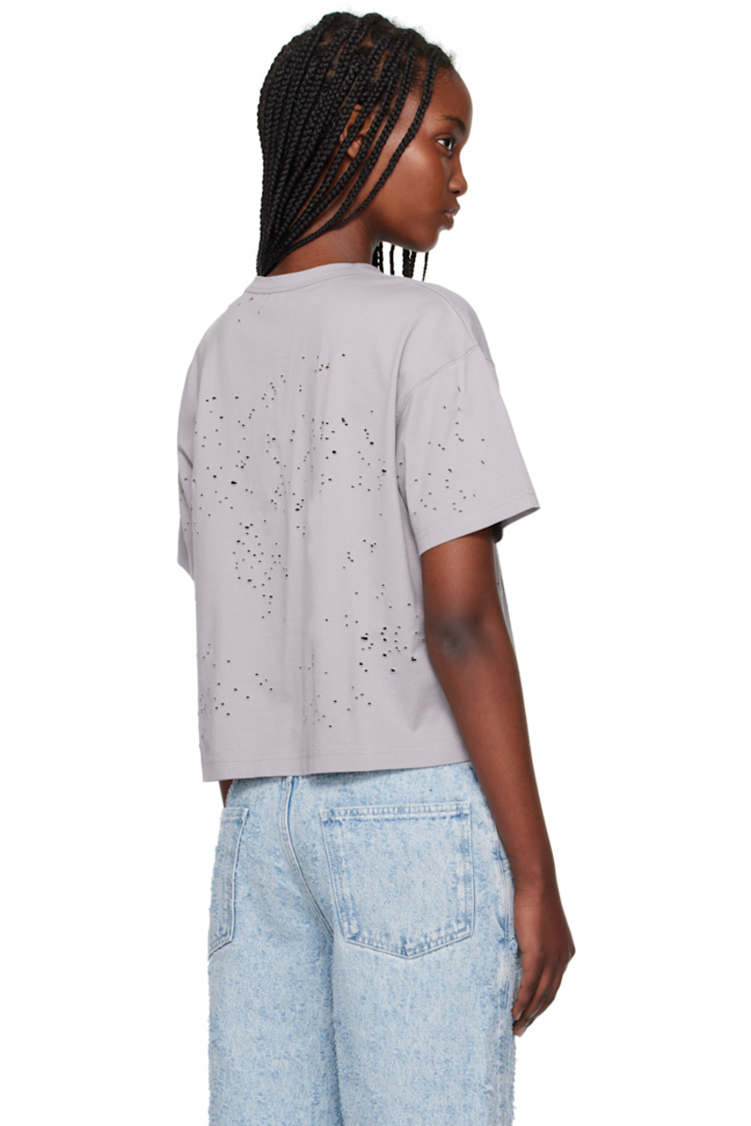 Cotton jersey T-shirt. Laser-cut distressing throughout.

· Rib-knit crewneck
· Cropped hem 
· Dropped shoulders

Supplier color: Light grey