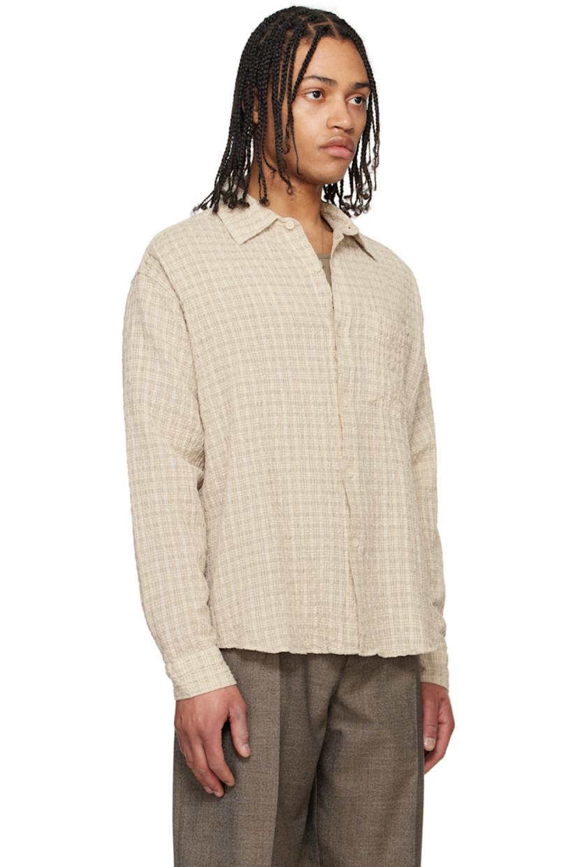 Cotton- and linen-blend seersucker shirt. Check pattern throughout.

· Spread collar
· Button closure
· Patch pocket at chest
· Shirttail hem
· Single-button barrel cuffs
· Box pleat at back yoke

Supplier color: Beige structure check