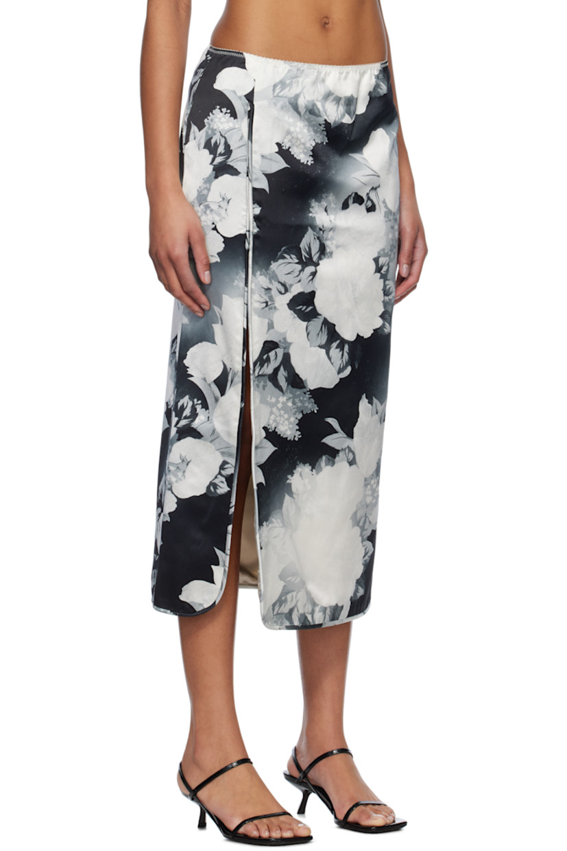 Viscose- and cotton-blend satin midi skirt. Piping and printed floral pattern throughout. 

· Scalloped detailing at elasticized waistband
· Slit at front hem
· Concealed zip closure at side 
· Darts at back waistband
· Full viscose satin lining

Supplier color: White/Black