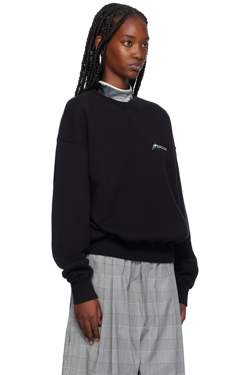 Cotton fleece sweatshirt.

· Rib-knit crewneck, hem, and cuffs
· Logo graphic embroidered at chest
· Dropped shoulders

Supplier color: Black overdye