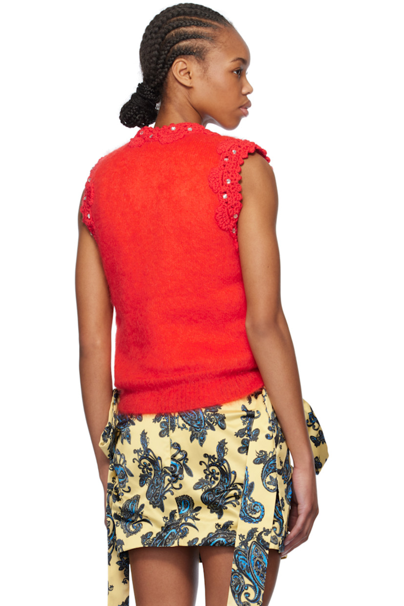 Padded brushed knit super kid mohair- and nylon-blend vest. Crystal-cut detailing throughout. 

· Crocheted trim at V-neck and armscyes 
· Embroidered floral pattern at front
· Rib-knit hem 
· Full viscose twill lining

Supplier color: Red