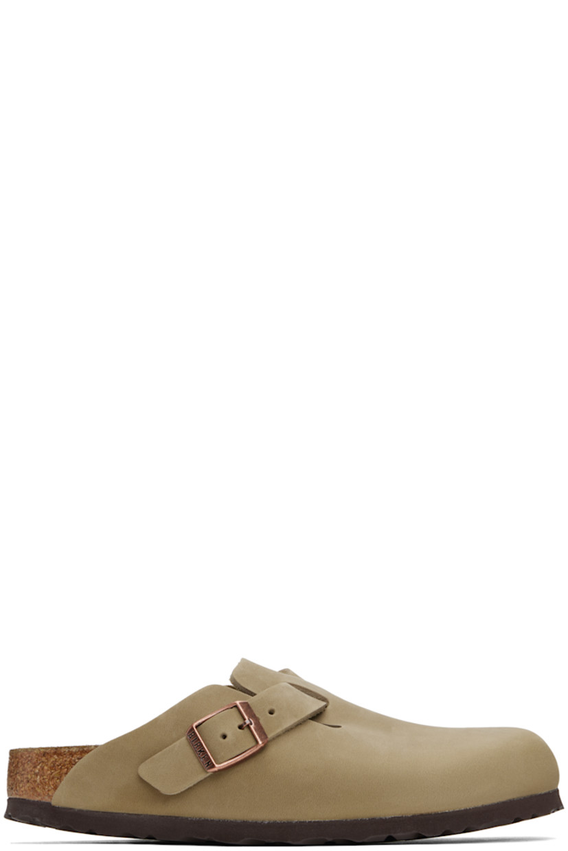 Oiled leather slip-on loafers in brown.

· Pin-buckle strap at vamp
· Logo embossed at inner side
· Logo printed at molded suede footbed
· Cork-latex midsole
· Treaded foam rubber sole
· Logo-engraved antiqued copper-tone hardware

Supplier color: Tobacco brown