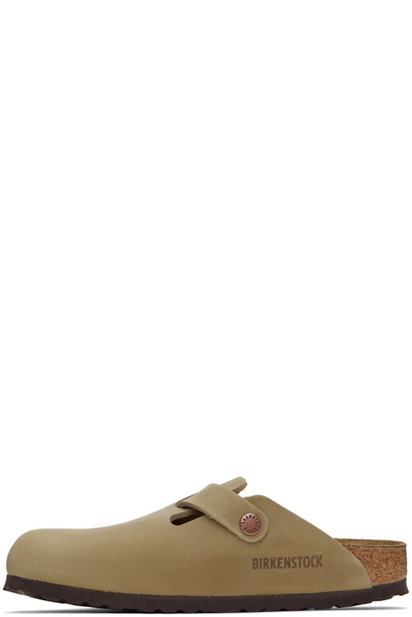 Oiled leather slip-on loafers in brown.

· Pin-buckle strap at vamp
· Logo embossed at inner side
· Logo printed at molded suede footbed
· Cork-latex midsole
· Treaded foam rubber sole
· Logo-engraved antiqued copper-tone hardware

Supplier color: Tobacco brown