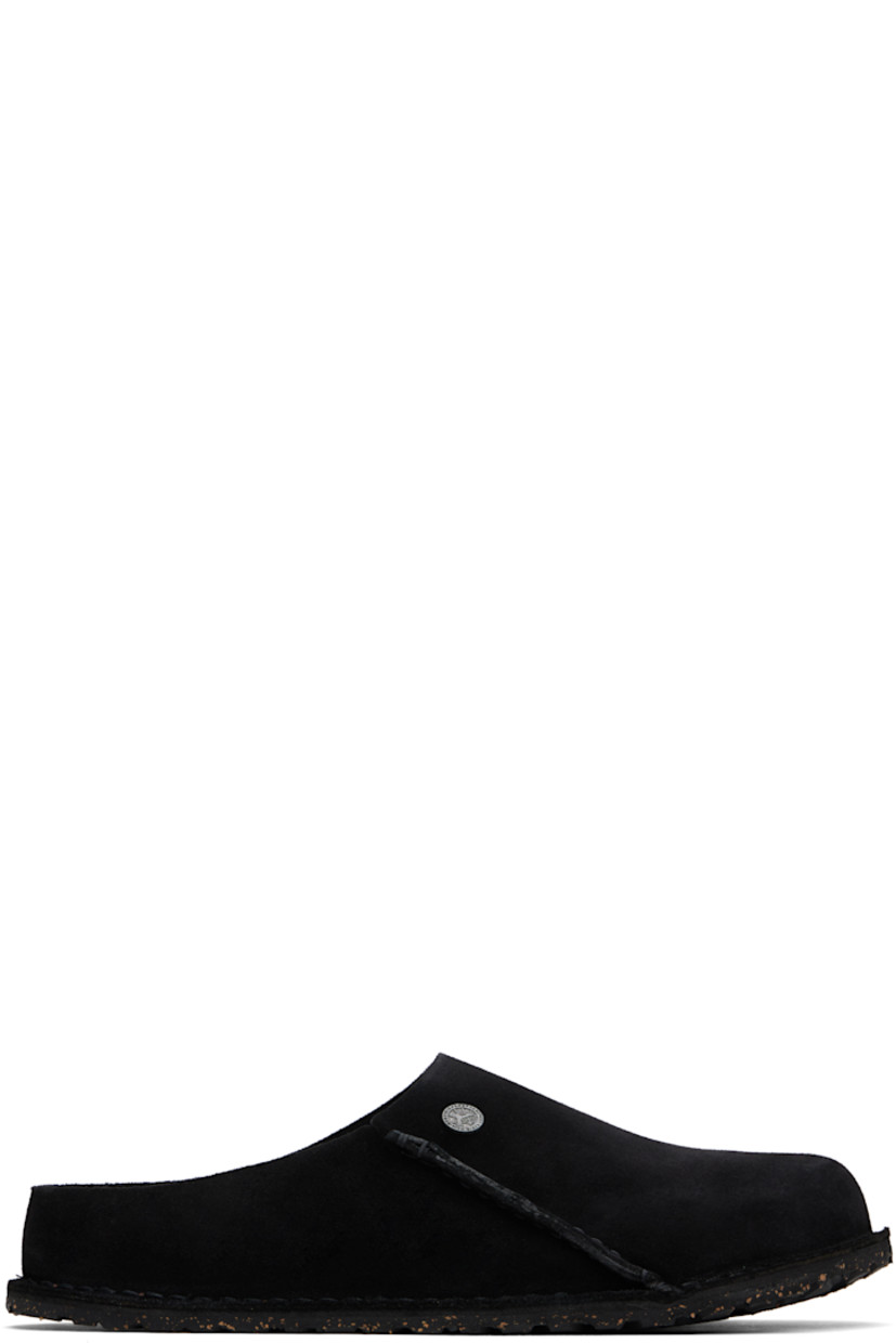 Suede loafers in black.

· Logo rivet at vamp
· Pinched seam at outer side
· Logo printed at molded suede footbed
· Cork-latex midsole
· Treaded rubber sole
· Logo-engraved gunmetal-tone hardware

Supplier color: Black suede
