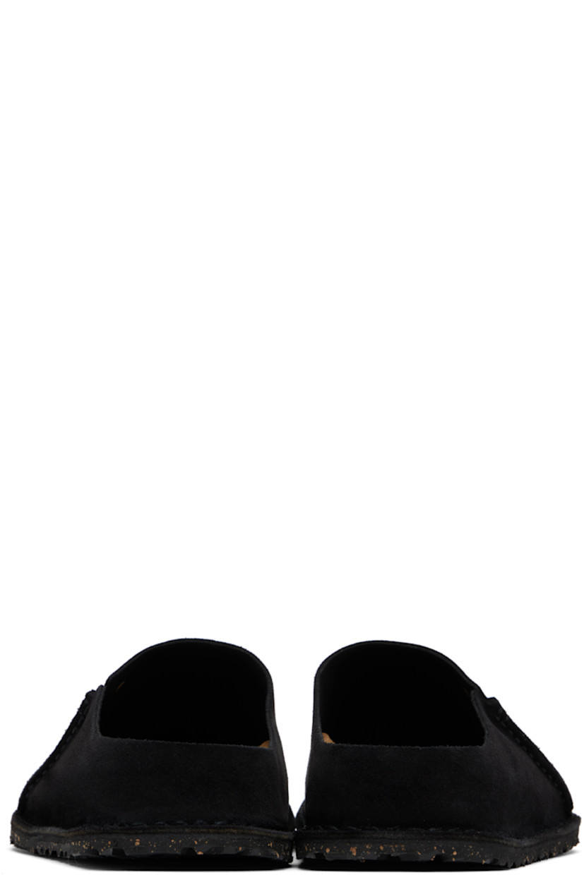 Suede loafers in black.

· Logo rivet at vamp
· Pinched seam at outer side
· Logo printed at molded suede footbed
· Cork-latex midsole
· Treaded rubber sole
· Logo-engraved gunmetal-tone hardware

Supplier color: Black suede