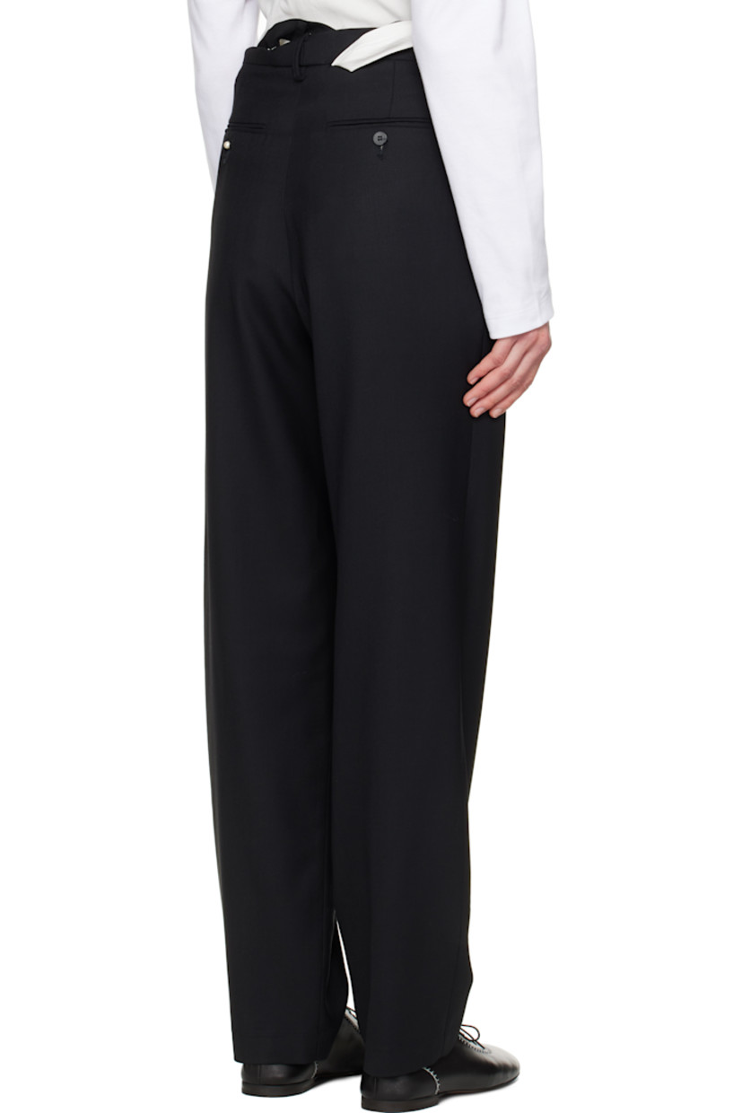 Virgin wool twill trousers. Logo-woven trim at integrated and twisted button fastening belt. 

· Belt loops 
· Four-pocket styling
· Zip fly
· Pleats at front
· Creased legs 
· Partial cotton poplin lining

Supplier color: Black
