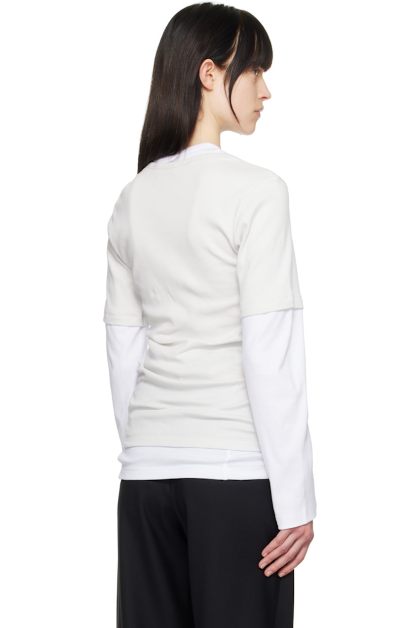Rib-knit stretch cotton T-shirt. 

· Jersey trim at crewneck, hem, and sleeves
· Logo embroidered at chest

Supplier color: White