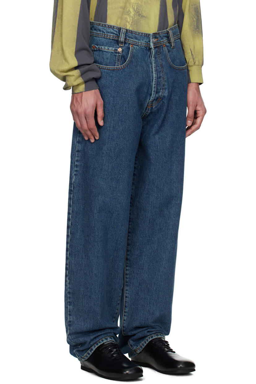 Tapered non-stretch denim jeans. Fading throughout.

· Belt loops
· Five-pocket styling
· Button fly
· Jacron logo patch at back waist
· Inset text patch at back
· Logo-engraved bronze-tone hardware
· Contrast stitching in tan

Supplier color: Officiana