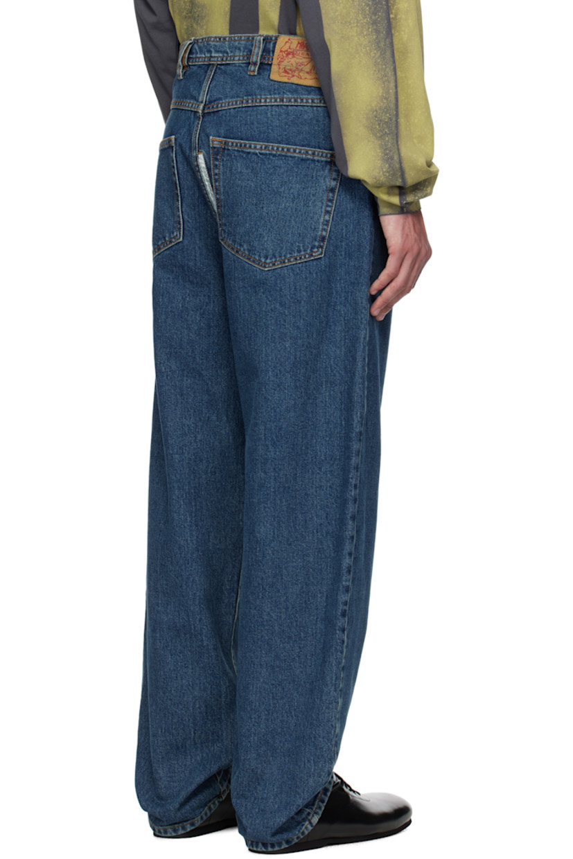Tapered non-stretch denim jeans. Fading throughout.

· Belt loops
· Five-pocket styling
· Button fly
· Jacron logo patch at back waist
· Inset text patch at back
· Logo-engraved bronze-tone hardware
· Contrast stitching in tan

Supplier color: Officiana