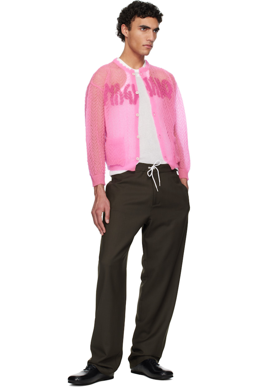 Semi-sheer nylon pointelle cardigan.

· Scalloped edge at round neck
· Button closure
· Logo printed at front
· Patch pockets
· Rib-knit hem and cuffs

Supplier color: Pink