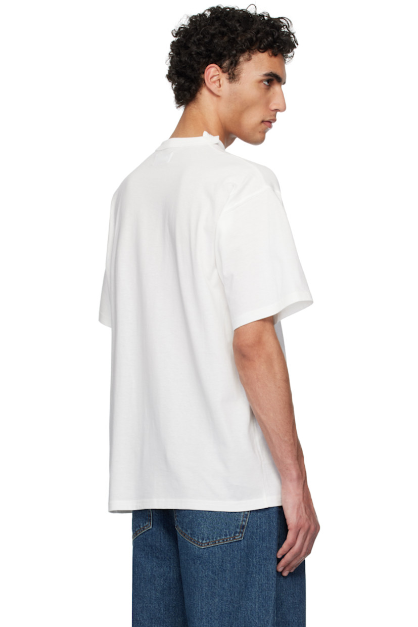 Cotton jersey T-shirt. 

· Rib-knit crewneck
· Logo graphic printed at front
· Dropped shoulders

Supplier color: White