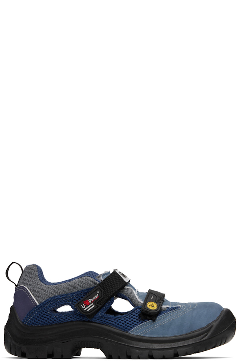Low-top paneled knit, canvas, and mesh sneakers in tones of blue. 

· Abrasion- and oil-resistant
· Anti-slip and anti-static 
· Perforations at toe
· Logo patch at velcro closure
· Padded tongue and collar
· Pull-loop at heel collar
· Cutouts at sides
· Treaded rubber sole 

Supplier color: Dark mix