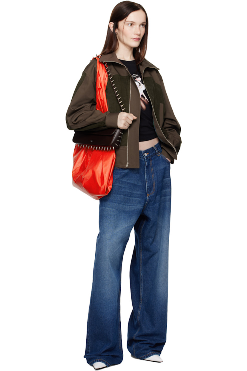 Baggy-fit stretch denim jeans. Fading and whiskering throughout. 

· Belt loops
· Five-pocket styling
· Zip-fly
· Leather logo patch at back waistband
· Logo-engraved silver-tone hardware
· Contrast stitching in tan

Supplier color: Blue