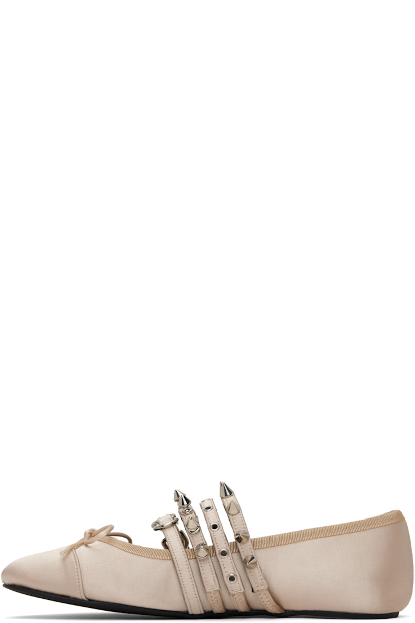 Satin ballerina flats in beige. 

· Bow at vamp
· Pin-buckle strap at vamp
· Grommets, studs, and D-rings at vamp straps
· Grosgrain trim at collar 
· Logo embossed at padded leather footbed
· Foam rubber sole

Supplier color: Pink