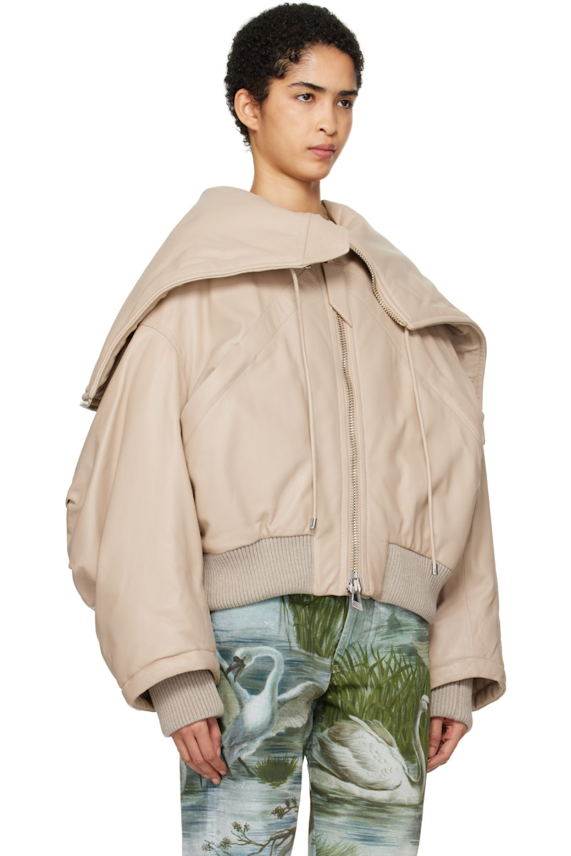 Padded buffed lambskin bomber jacket. 

· Drawstring and zip vent at hood
· Funnel neck
· Two-way zip closure
· Welt pockets
· Rib-knit hem and inset cuffs
· Dropped shoulders
· Darts at sleeves
· Welt pocket at interior
· Full logo-woven viscose twill lining

Supplier color: Ivory